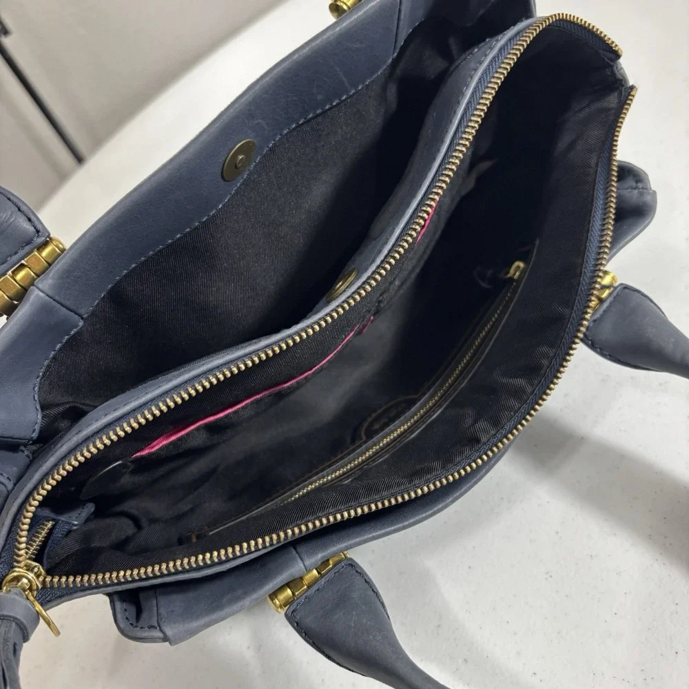 The Sak Serena Leather Handbag Navy Blue Tobacco Souk Floral Embossed